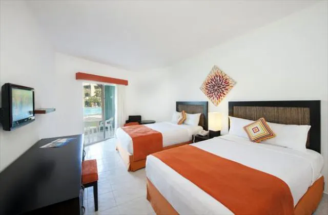 Hotel todo incluido Casa marina Reef habitacion 2 grandes camas